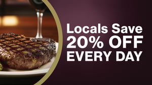 Couple playing slots at Grand Sierra Resort.